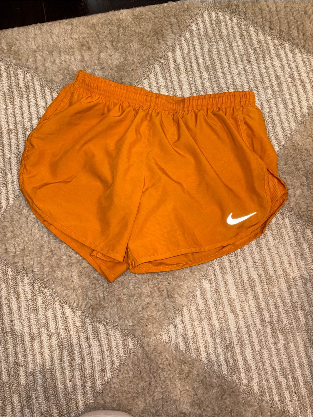 Nike Women's Bright Orange Athletic Shorts with White Swoosh